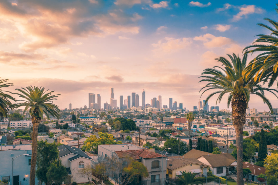 A skyline of los angeles with new restaurants in 2021.
